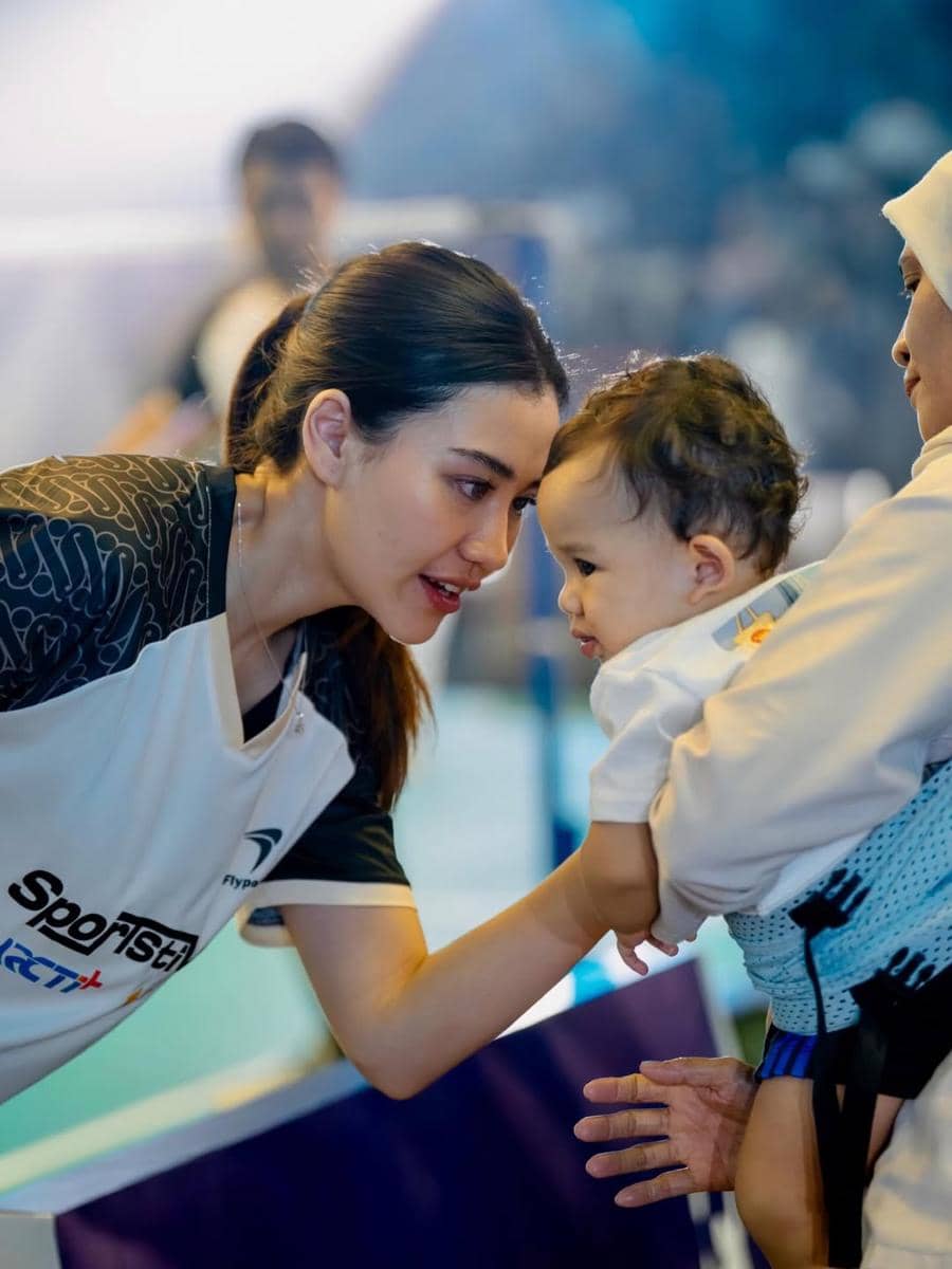 Aaliyah dan Thariq bertanding di kompetisi bulu tangkis