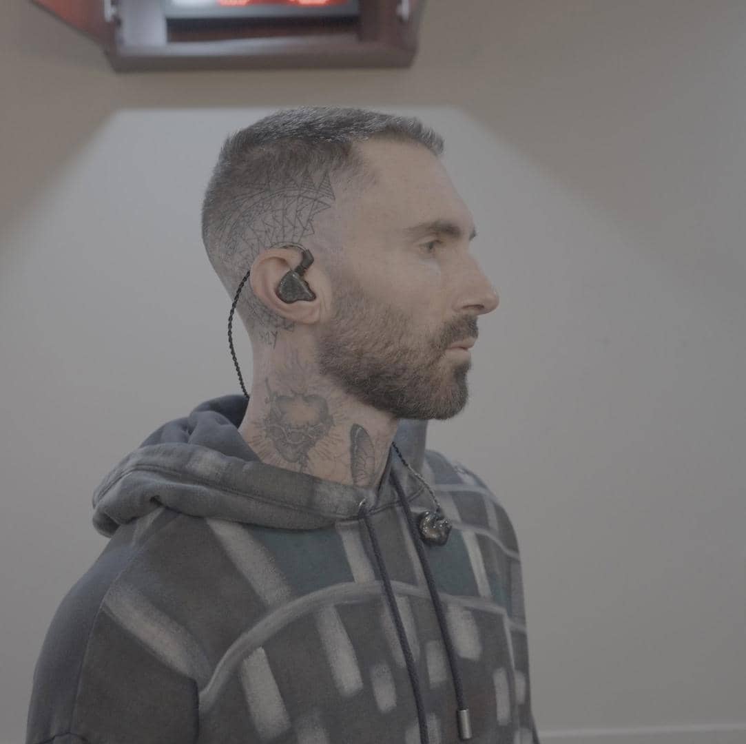 Adam Levine with in-ears.jpg