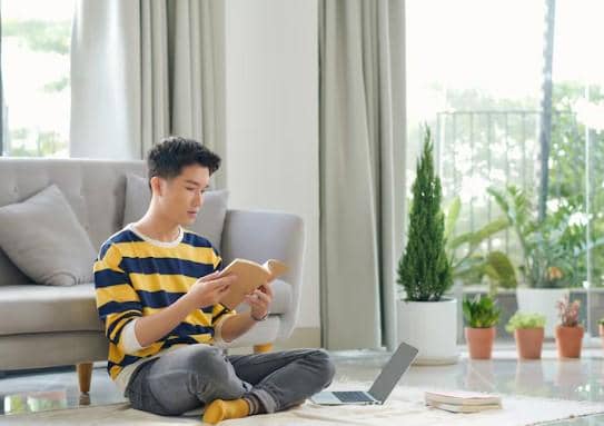 ilustrasi duduk santai membaca buku 