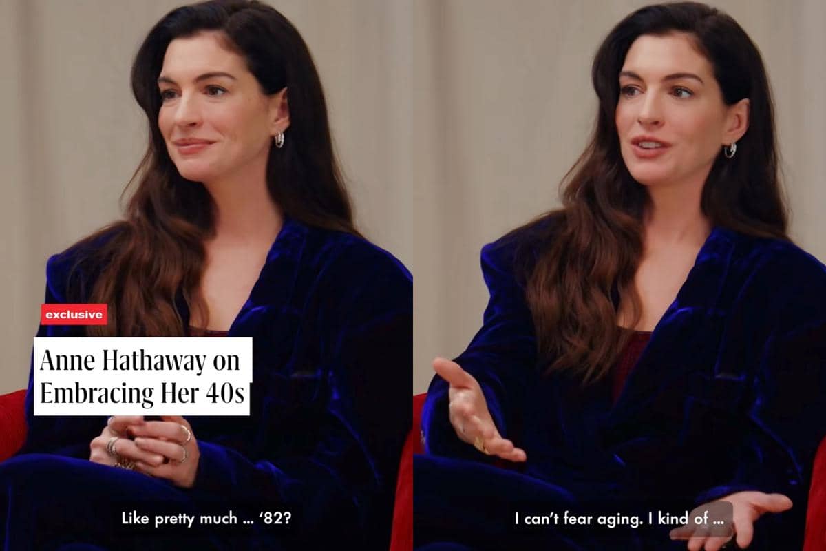 Seorang perempuan berambut panjang mengenakan blazer beludru biru sedang berbicara dalam wawancara eksklusif di ruangan bercahaya lembut.