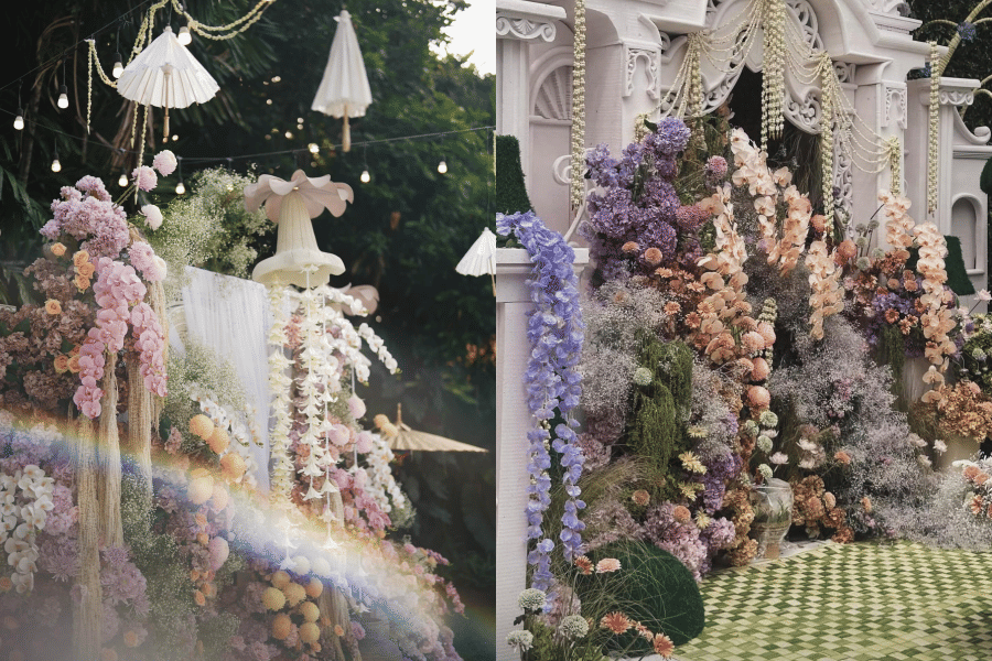 Dekorasi siraman dengan rangkaian bunga warna pastel dan ungu, dihiasi lampu gantung serta elemen taman yang elegan di area outdoor.