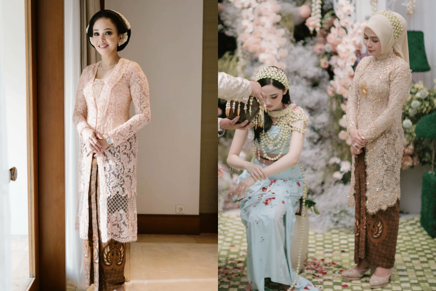Dua wanita mengenakan kebaya tradisional Jawa berwarna pastel saat menghadiri acara pengajian dan siraman anak mereka.