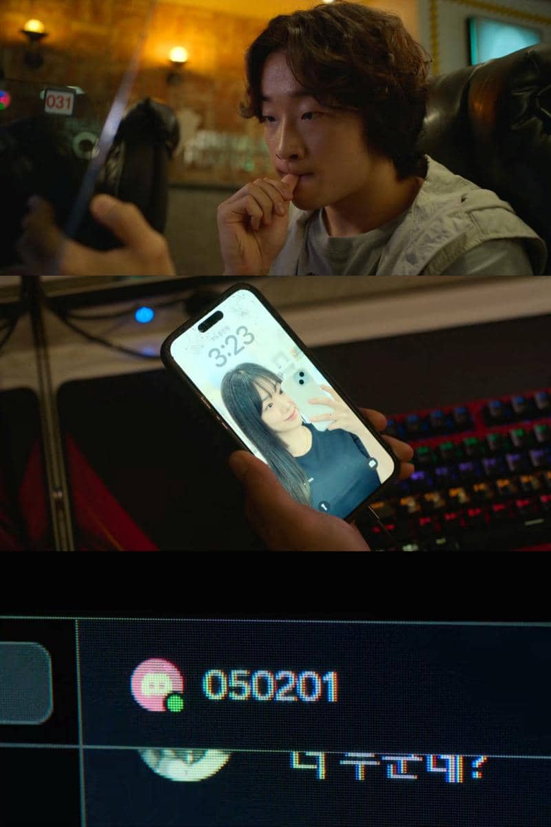 Seorang pria muda duduk di depan komputer sambil melihat ponsel dengan foto seorang wanita di layar, diambil dari drama Korea If Wishes Could Kill.