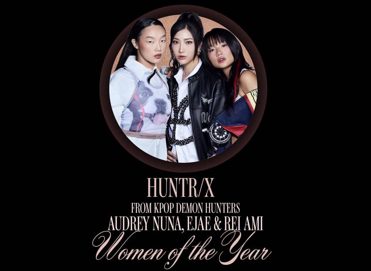 Poster HUNTR/X menampilkan tiga anggota grup dengan gaya modis, merayakan penghargaan Women of the Year Billboard Women in Music 2026.