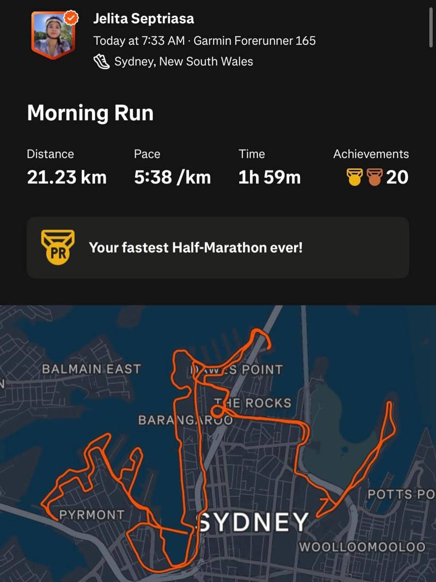 Tangkapan layar hasil lari pagi sejauh 21,23 km di Sydney dengan peta rute dan catatan waktu 1 jam 59 menit serta kecepatan 5:38 per km.