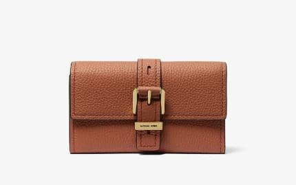 Michael Kors Nolita Medium Pebbled Leather Tri-Fold Wallet (michaelkors.global/id)
