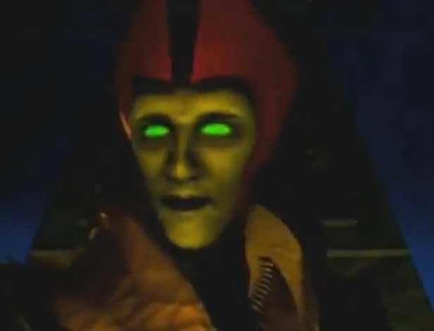 Karakter Shinnok dengan mata hijau bercahaya dan wajah berwarna hijau dalam desain lama dari permainan Mortal Kombat 4.