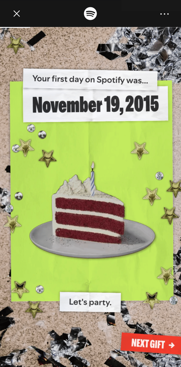 Tampilan kampanye Spotify dengan latar hijau, potongan kue merah berlapis krim dan lilin, serta teks tanggal 19 November 2015.