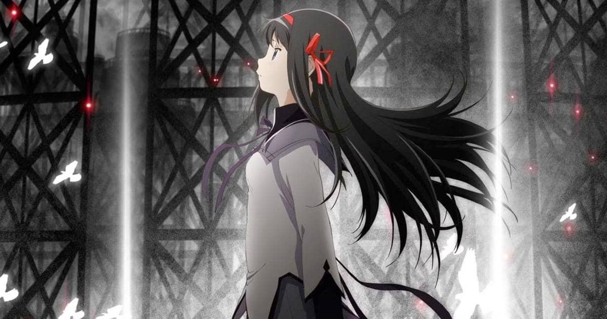 Karakter anime berambut panjang hitam dengan pita merah berdiri menatap ke atas di latar belakang gelap dengan cahaya vertikal.
