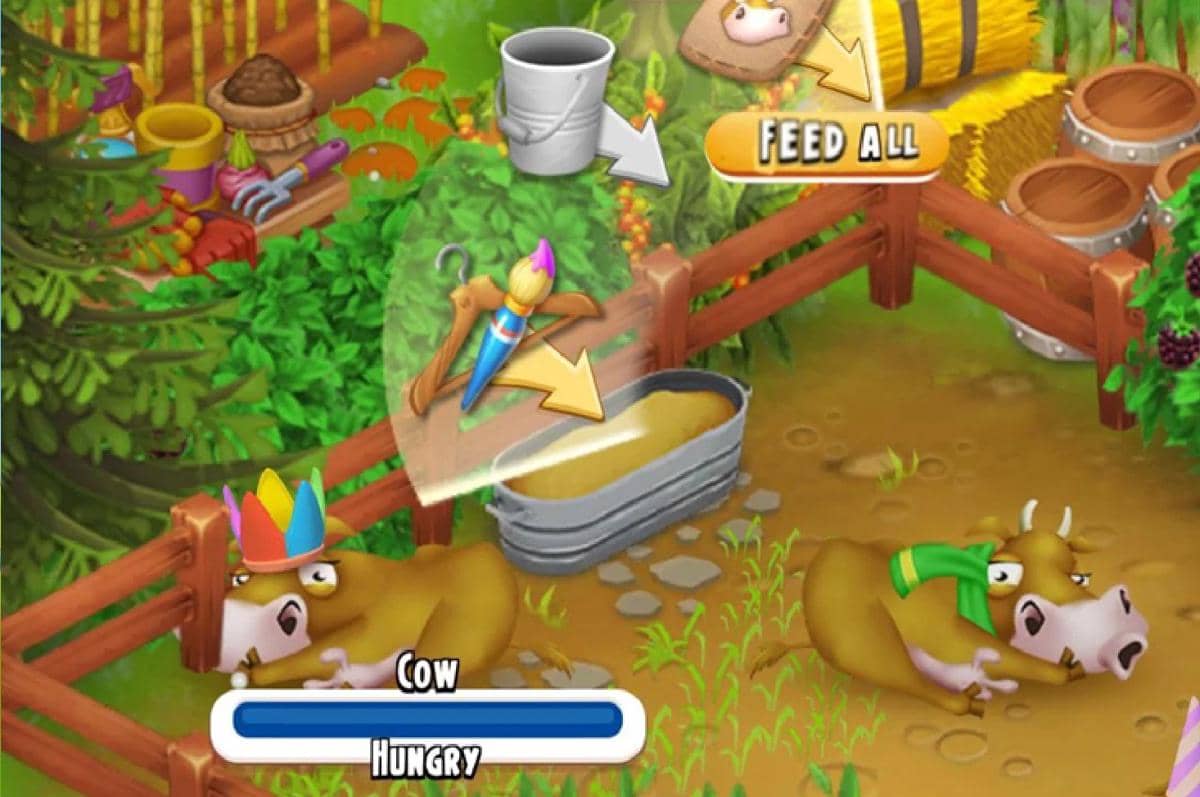 Cuplikan gameplay memberi makan sapi di Hay Day. 