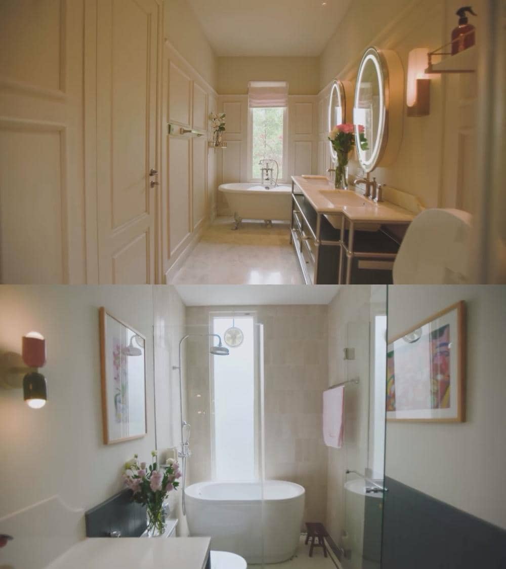 Interior kamar mandi mewah dengan bathtub bergaya klasik, cermin bundar besar, dan pencahayaan hangat bernuansa elegan.