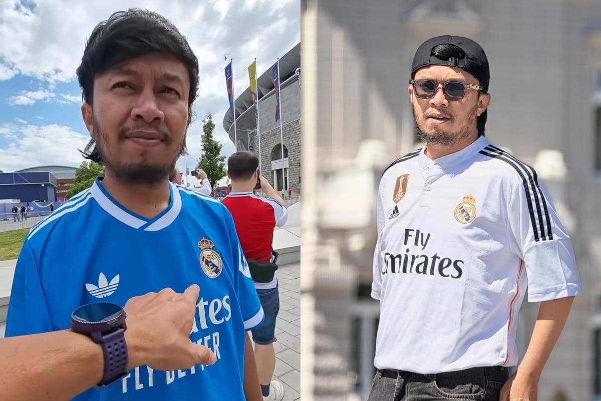 Seorang pria mengenakan jersey Real Madrid biru dan pria lain memakai jersey Real Madrid putih di luar stadion saat cuaca cerah.