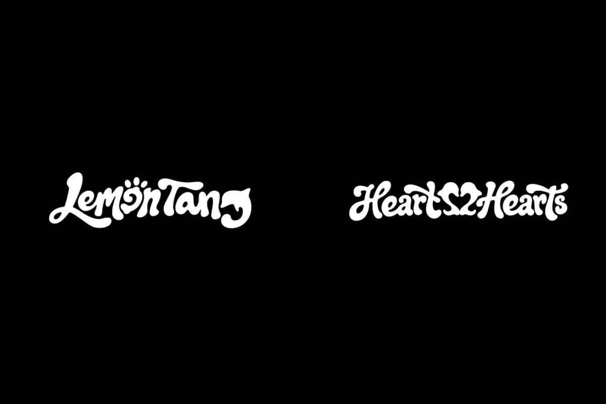 Logo putih bertuliskan Lemon Tang dan Hearts2Hearts dengan latar belakang hitam sebagai teaser mini album kedua.