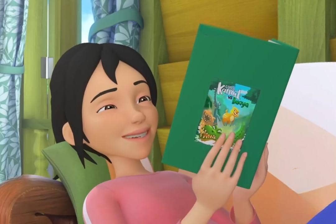 Kak Ros membaca buku Sang Kancil vs Buaya