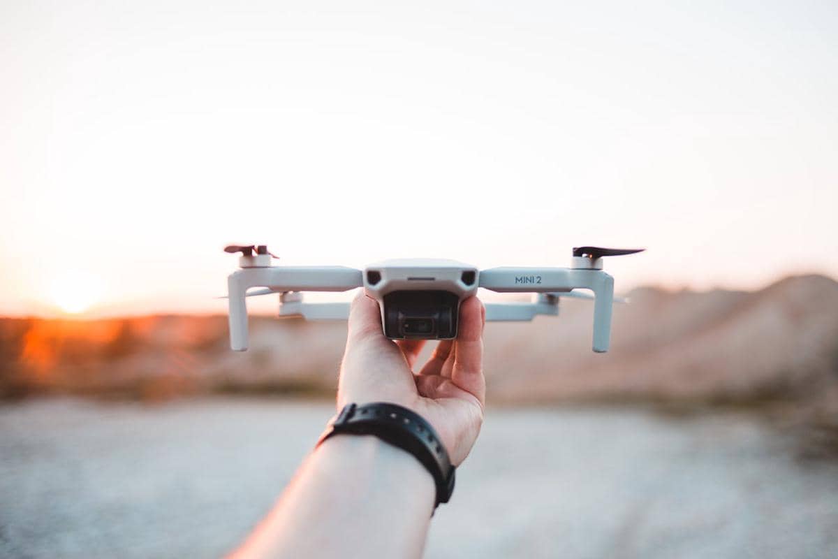 https://www.pexels.com/photo/person-holding-a-drone-machine-9182734/