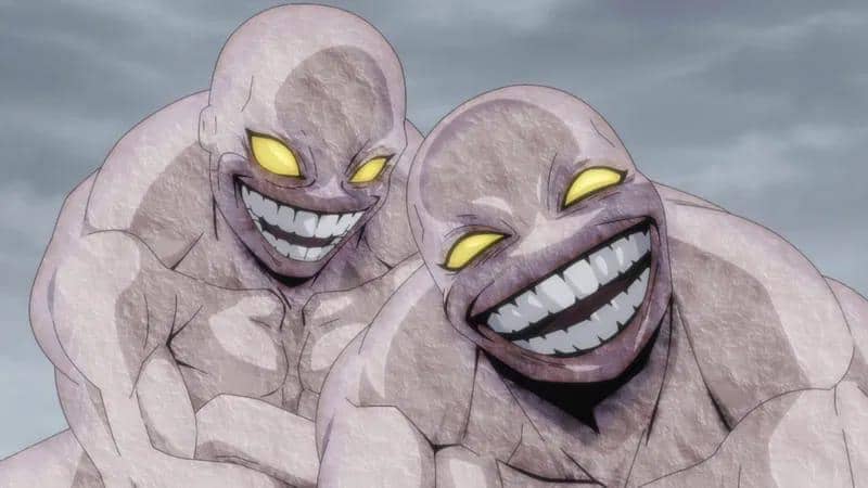 Dua makhluk humanoid berkulit abu-abu dengan mata kuning menyala dan senyum lebar menakutkan dari anime Daemons of the Shadow Realm.