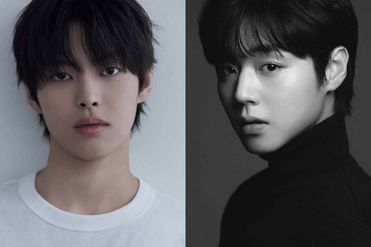 Dua pria berambut hitam dengan gaya rambut serupa, satu mengenakan kaus putih dan satu mengenakan turtleneck hitam dalam potret close-up.