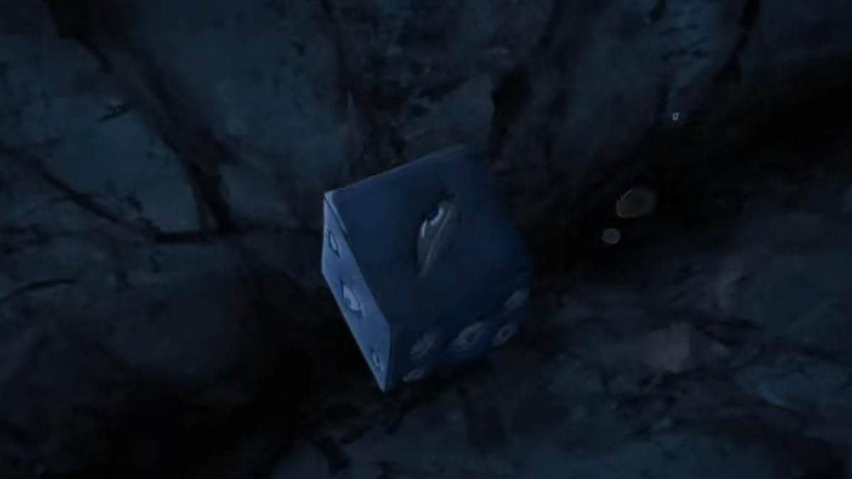 Kotak Prison Realms berwarna gelap tenggelam di dasar laut dengan latar batuan biru dari cuplikan trailer Jujutsu Kaisen S4.