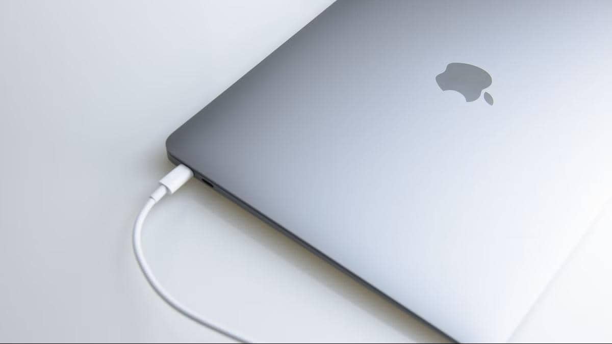 Apple-MacBook-plugged-into-a-charger.jpg
