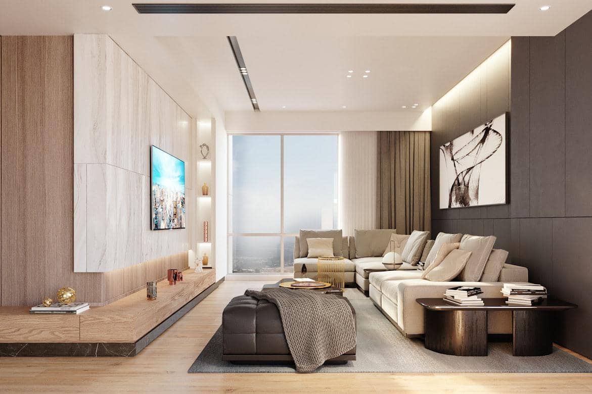 https://unsplash.com/id/foto/ruang-tamu-modern-dengan-sofa-sectional-dan-jendela-besar-yxO8YG082v8