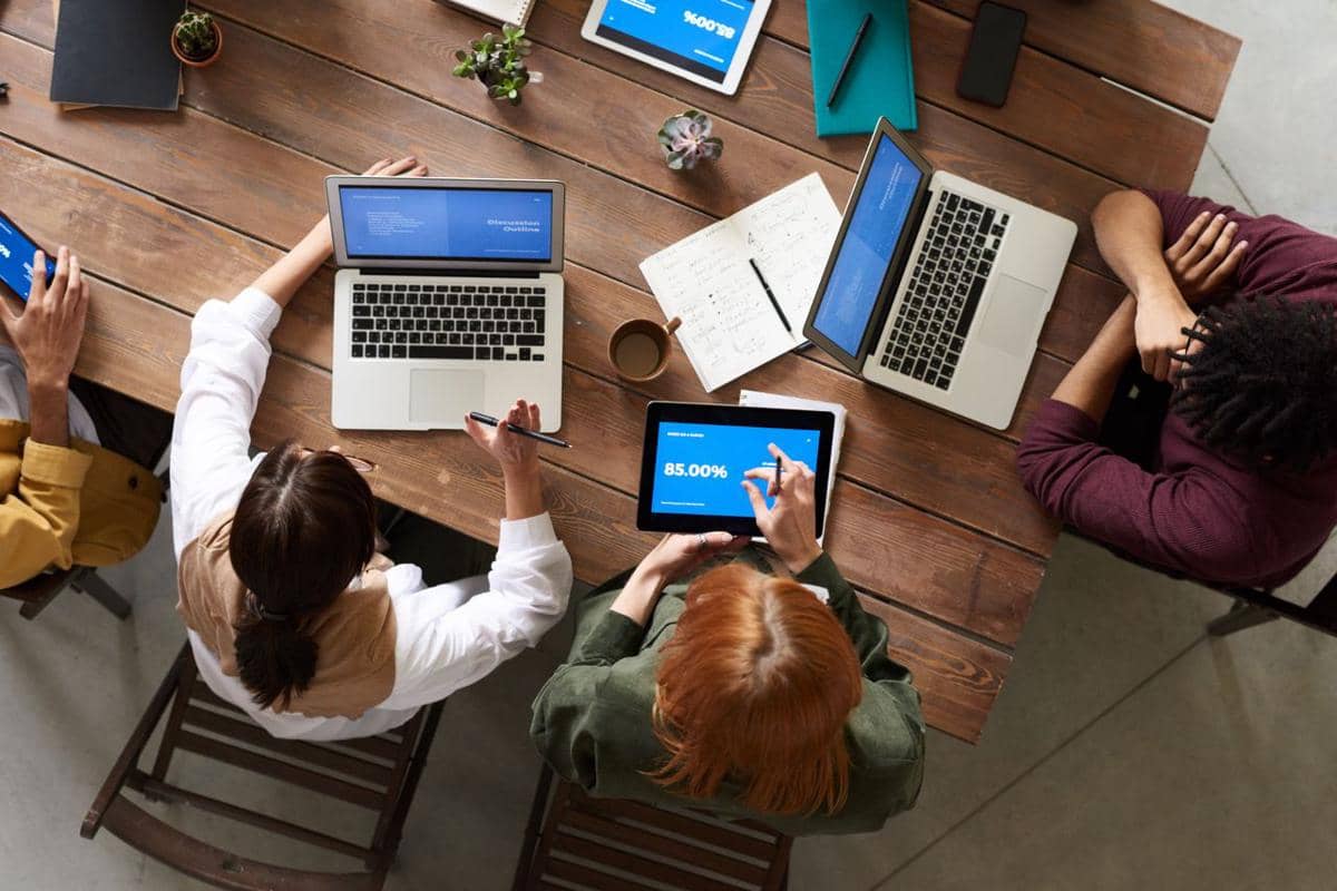 https://www.pexels.com/photo/top-view-photo-of-people-discussing-3182774/