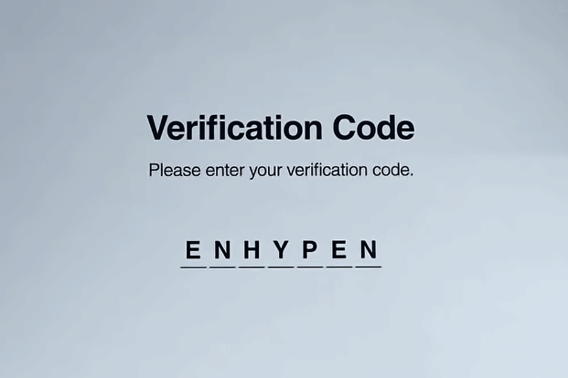 Tampilan layar dengan teks 'Verification Code' dan logo ENHYPEN berwarna hitam di latar belakang abu-abu muda.