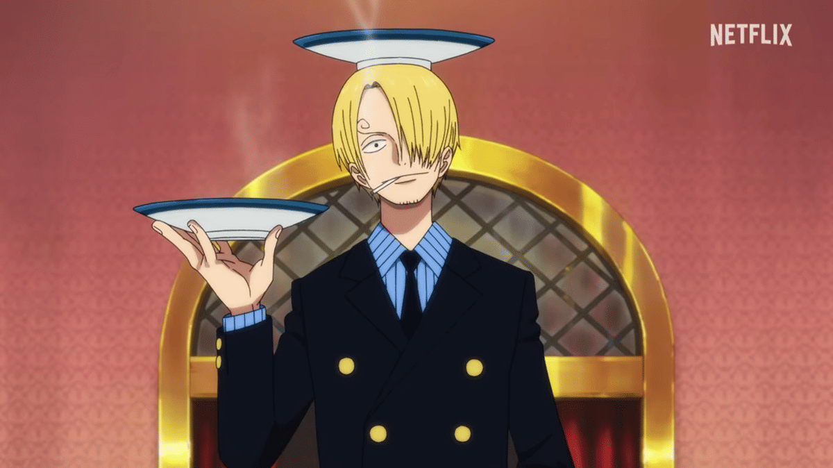 Sanji mengenakan setelan jas hitam dengan kemeja biru dan dasi, menyeimbangkan dua piring di kepala dan tangannya sambil merokok.