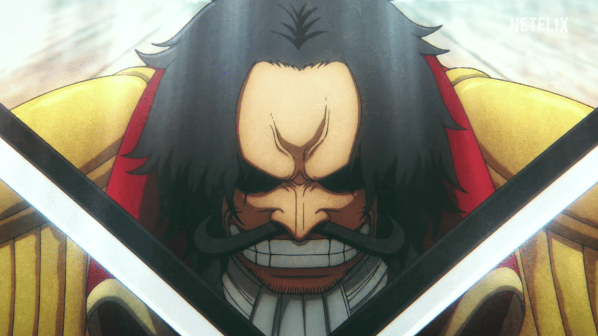 Karakter anime berambut hitam dengan kumis tebal mengenakan mantel kuning dan memegang dua pedang bersilang di depan wajahnya.