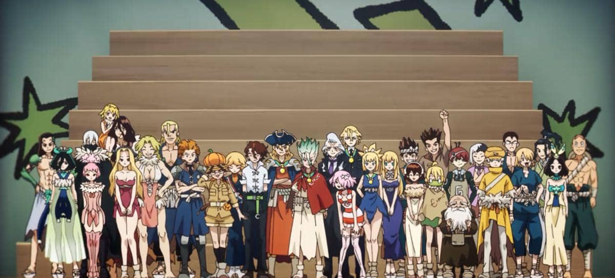 Para karakter anime berdiri bersama di depan tangga besar dengan latar berwarna hijau dan motif bintang, mewakili Kerajaan Sains.