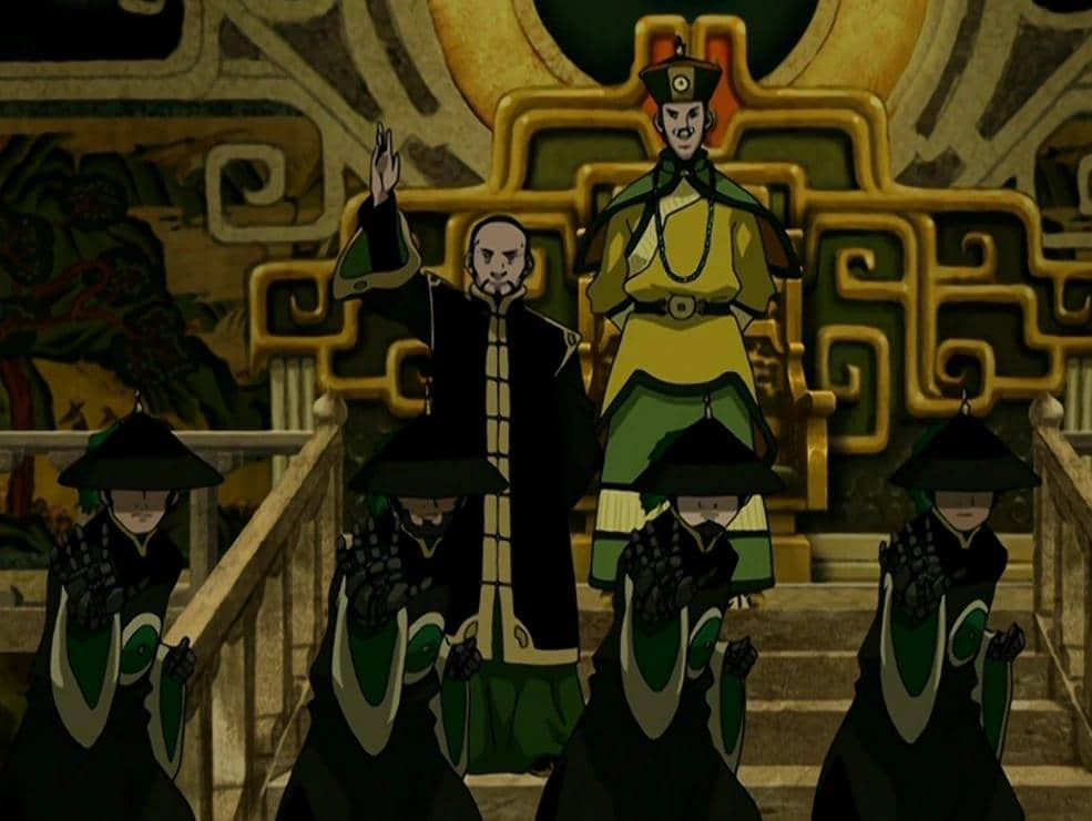 Beberapa karakter dari serial animasi Avatar: The Last Airbender mengenakan pakaian hijau dan hitam di depan latar dekoratif kerajaan.