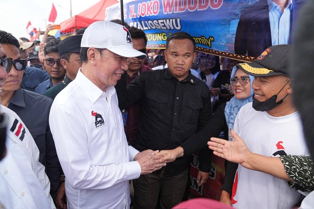 Jokowi Pakai Baju Logo PSI: Artinya Tahu Sendiri