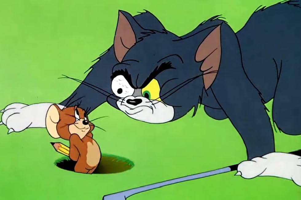 Jerry menggambar pupil pada golf yang menancap ke mata Tom