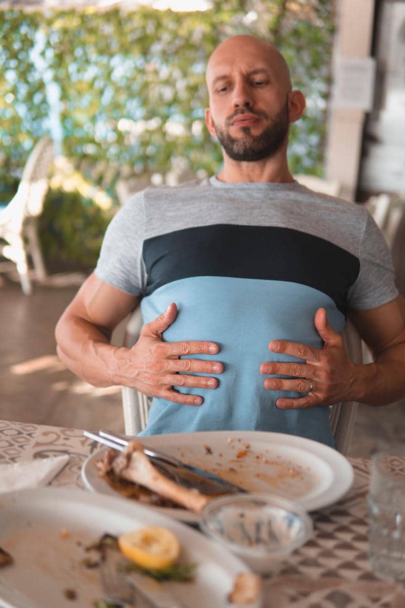 Not hungry and touch stomach