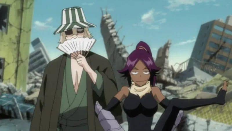 Dua karakter anime, Urahara dan Yorichi, berdiri di antara reruntuhan bangunan dengan latar langit biru dan puing-puing di sekitarnya.