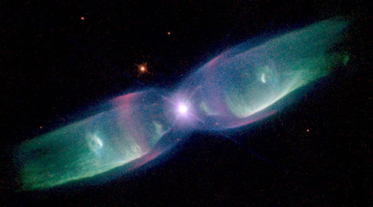 ilustrasi twin jet nebula yang lahir dari drama dua bintang