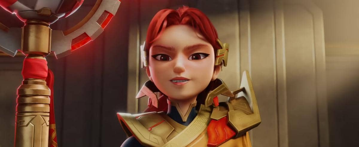 Karakter animasi berambut merah mengenakan baju zirah emas dan merah memegang tongkat besar dalam cuplikan film Boboiboy Movie 3.