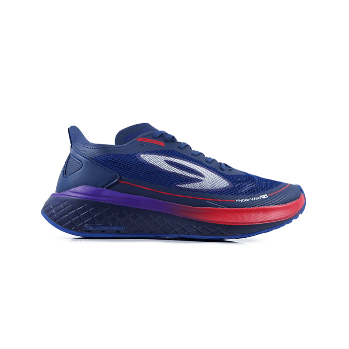 Sepatu lari 910 Kenzo Run berwarna biru dengan aksen merah dan ungu, menampilkan desain sol tebal dan bahan jaring ringan.