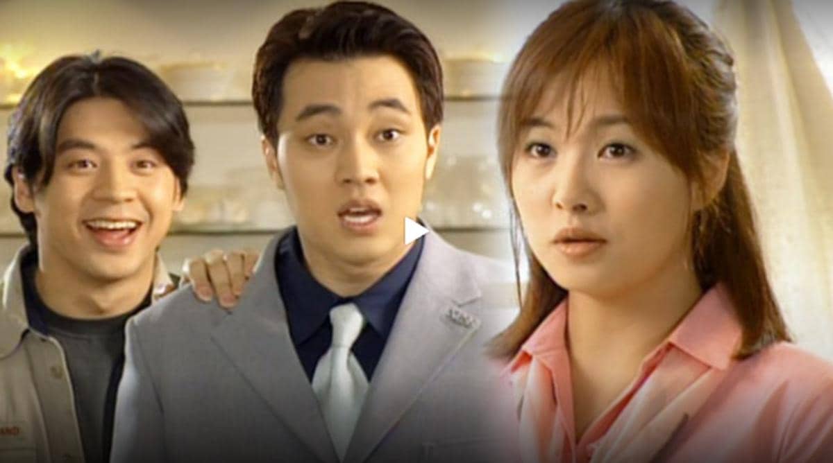 Tiga pemeran utama drama Korea Great Great berdiri di dalam ruangan, dua pria tampak terkejut sementara seorang wanita menatap serius.
