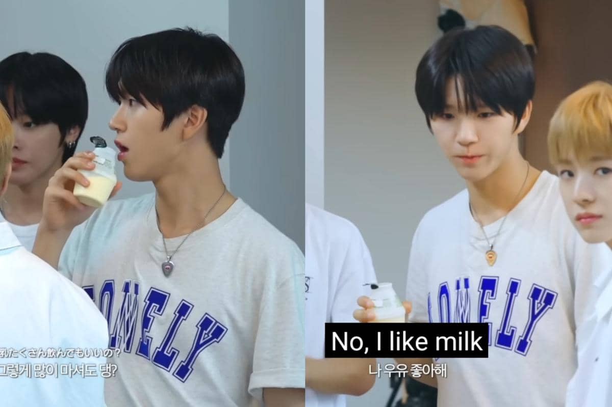 Jaehee NCT WISH tengah meminum banana uyu alias susu pisang dalam salah satu konten video