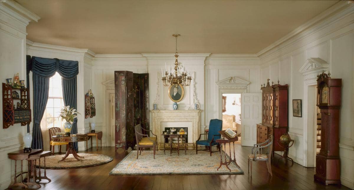 https://unsplash.com/id/foto/ruang-tamu-yang-dipenuhi-dengan-furnitur-dan-tempat-perapian-pnGfQDrfuvw