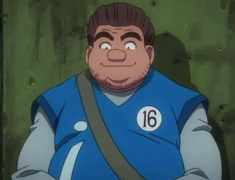 Karakter anime berambut cokelat dengan seragam biru bernomor 16 sedang tersenyum di latar dinding hijau.