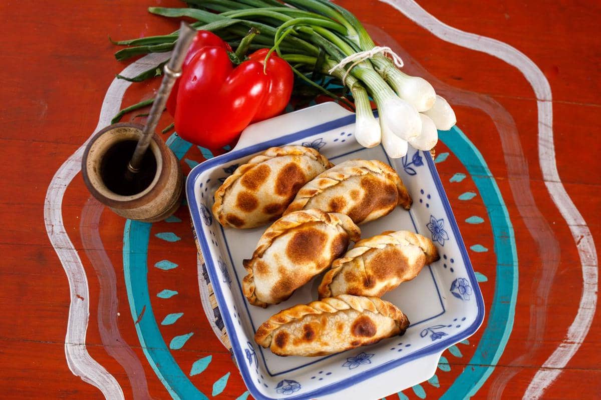 https://www.pexels.com/photo/close-up-shot-of-empanadas-in-a-bowl-8279713/