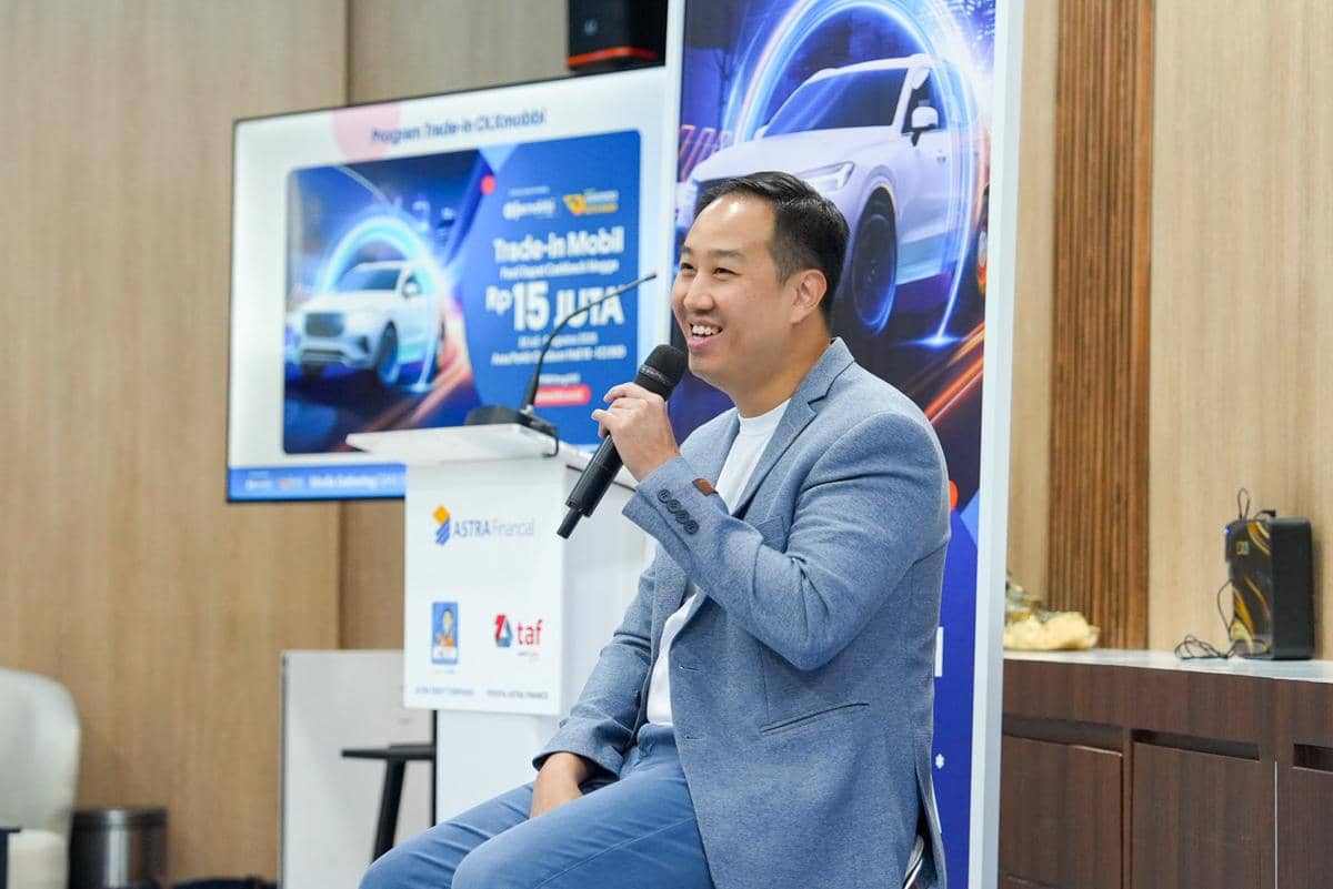 Suasana booth OLXmobbi di ajang GIIAS yang menyoroti pertumbuhan layanan trade-in kendaraan bagi pengunjung.