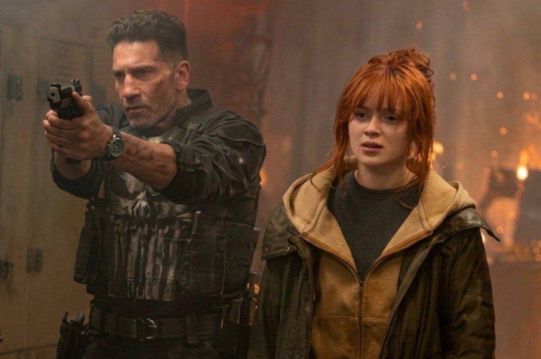 Foto hasil AI yang menampilkan karakter Frank Castle dan Jean Grey dalam satu komposisi digital bergaya ilustratif.