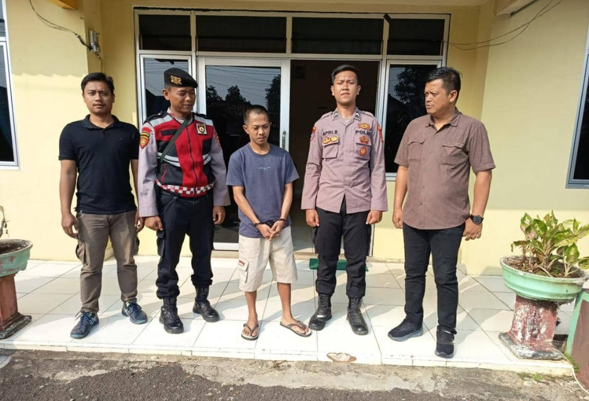 Tersangka Heru Purwanto menjalani pelimpahan tahap II.