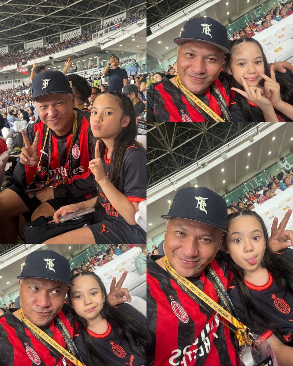 Gempi berada di lapangan GBK sebagai pendamping salah satu pemain AC Milan pada sebuah pertandingan sepak bola.