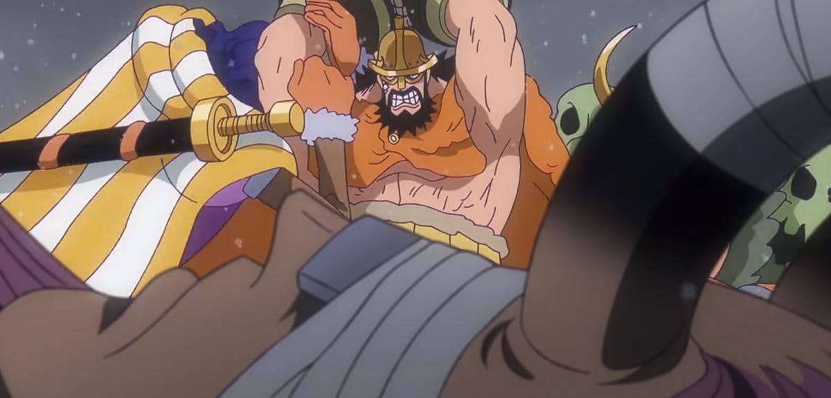 Hajrudin mengayunkan pedang besar ke arah Loki yang terpojok dalam adegan pertarungan anime One Piece.
