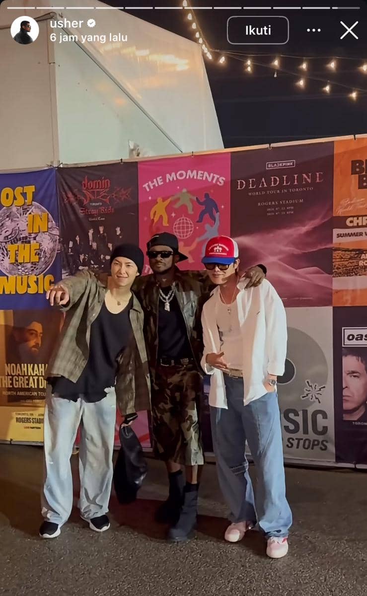 J-Hope dan RM BTS dalam potret saat menonton konser Usher dan Chris Brown yang diunggah melalui Instagram Usher.