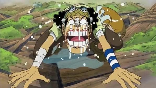 Usopp menangis sambil memohon kepada Luffy agar diizinkan kembali bergabung dengan kru Topi Jerami dalam One Piece.