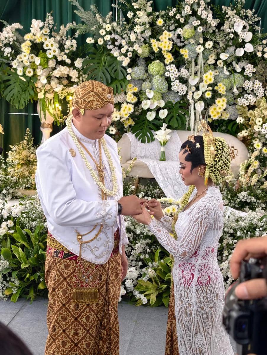 Potret pernikahan Wancoy dari Grind Boys dalam unggahan yang dibagikan melalui akun Instagram pergijauh.